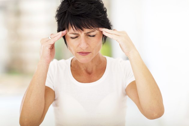 mid age woman having headache