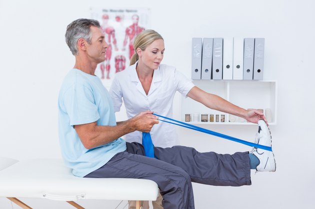 Doctor examining her patient back legs