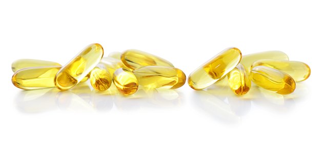 Cod liver oil omega 3 gel capsules isolated on white
