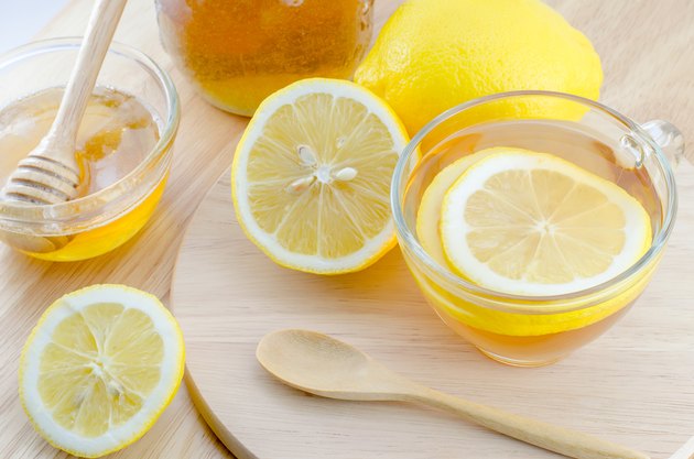 Honey lemon tea on wooden table