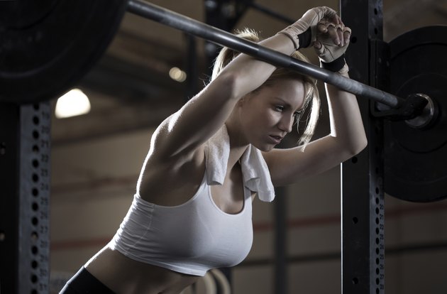 Woman training at crossfit center