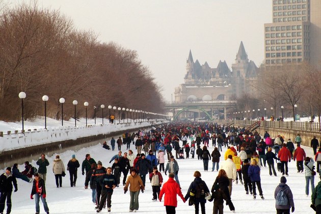 Winterlude skaters on Rideau Canal skate-way, Ottawa Canada.