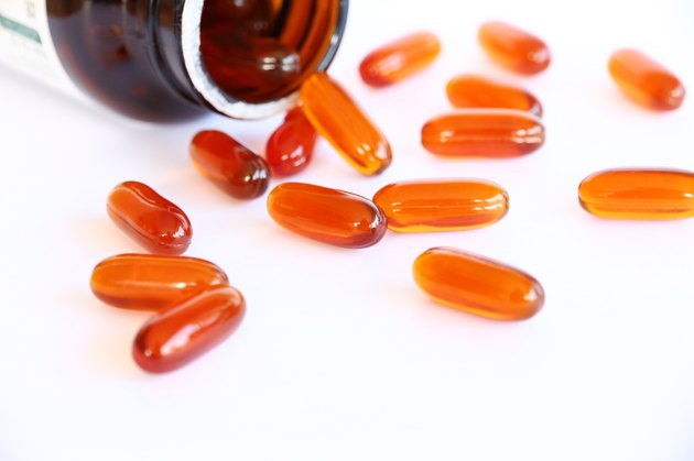 gel vitamin supplements on white