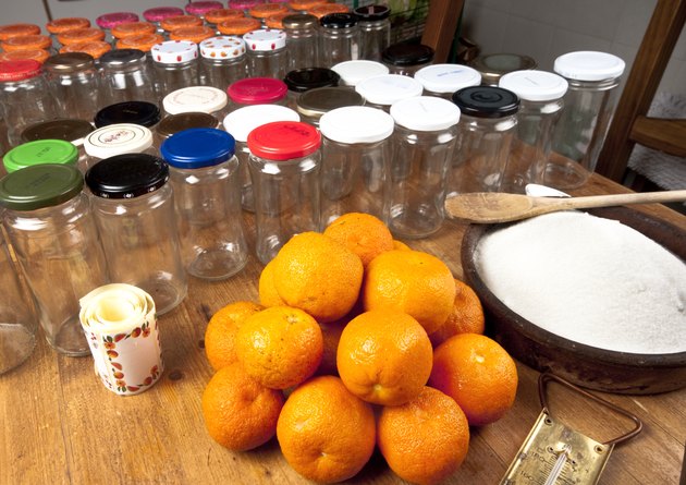 Seville oranges, sugar, and jam jars.