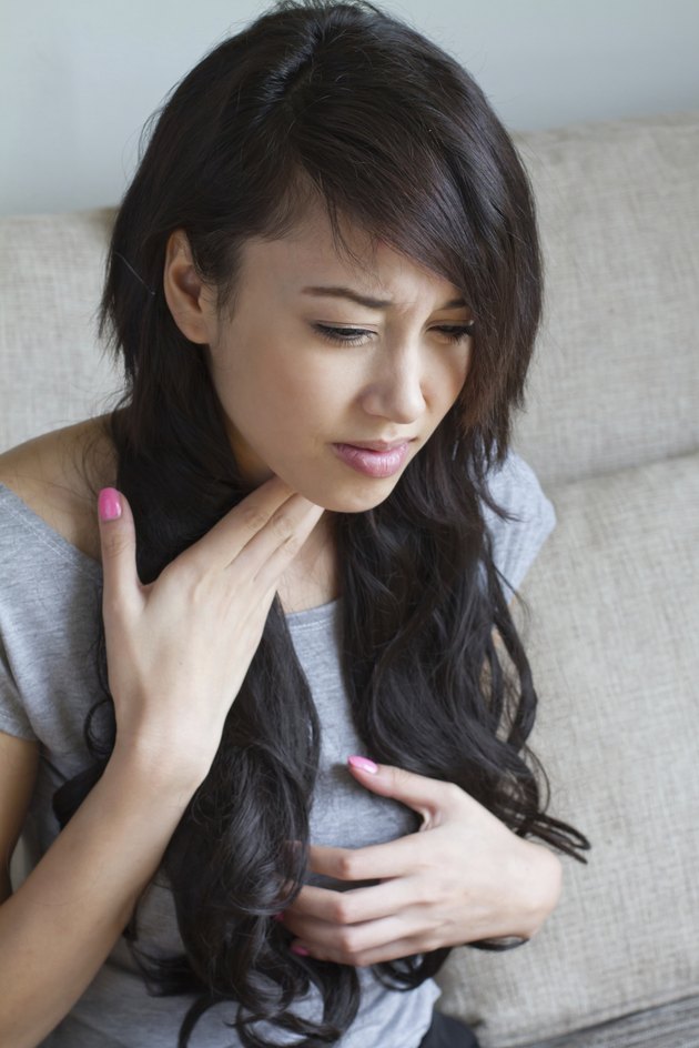 sick woman with sore throat, inflammation