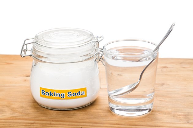 Baking soda with glass of water for multiple holistic usages
