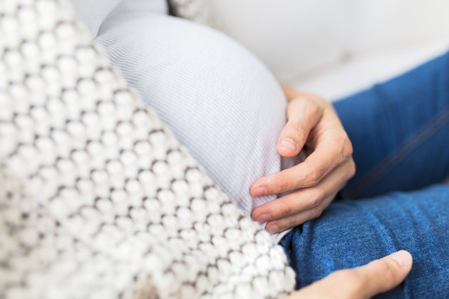 Pregnant woman resting at home