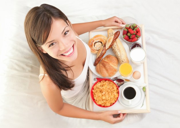 Breakfast in bed woman