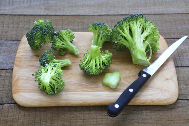 fresh broccoli on cutting board