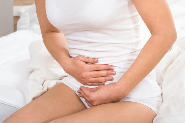 Woman Suffering From Stomach Ache