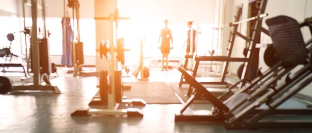 Blurred of fitness gym background for banner presentation.