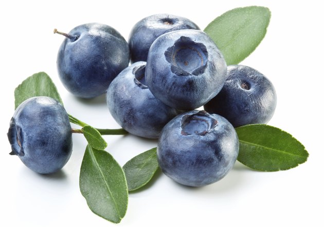 Blueberries with leaves.
