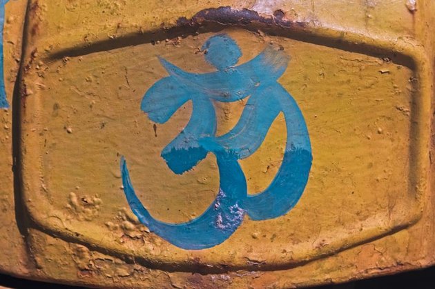 Om, Holy Sign Painted on wall, India