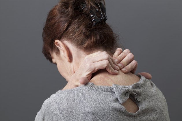 suffering from a painful neck and overwork