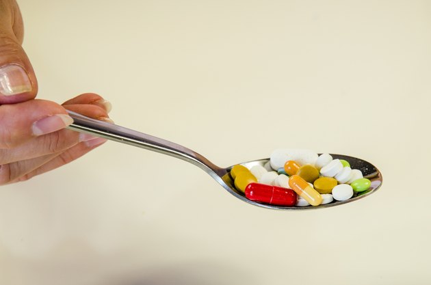 pills on spoon