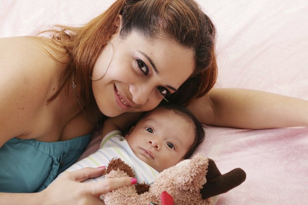 mum and baby boy smiling
