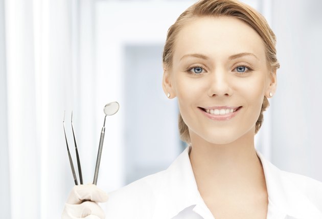dentist with tools