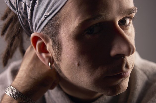 Studio portrait of man wearing bandana