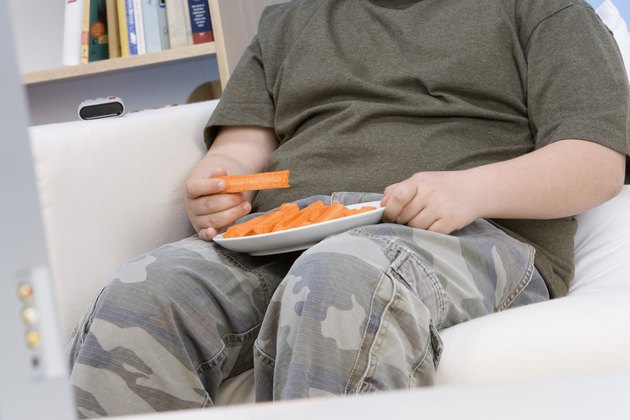 Boy Eating Carrot Sticks