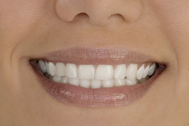 Extreme close-up of young woman's smile
