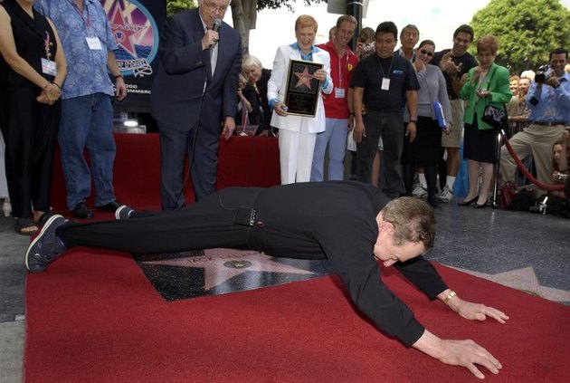 HOLLYWOOD - SEPTEMBER 26: Physical fitness expert Jack LaLanne does push-ups over his new star on the Hollywood Walk of Fame on September 26, 2002 in Hollywood, California. (Photo by Vince Bucci/Getty Images)