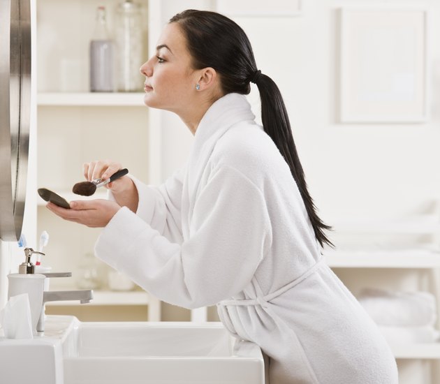 Woman Putting on Makeup