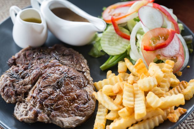 Rustic grilled beefsteak with french fries