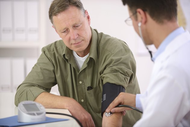 Doctor measuring blood pressure