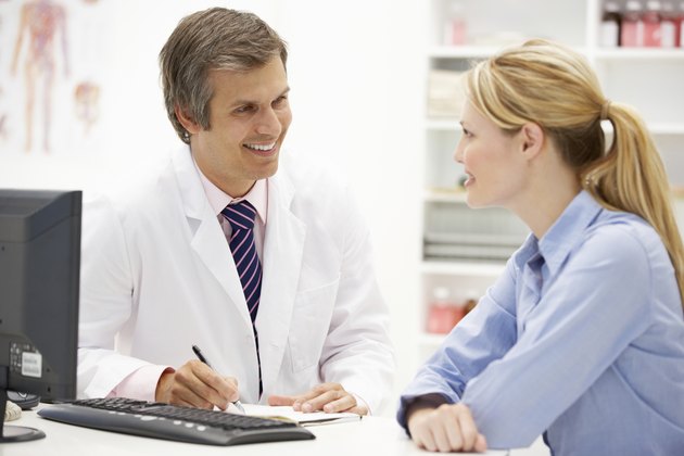 Doctor with female patient