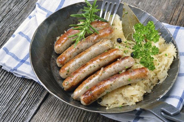 Fried sausages on sauerkraut