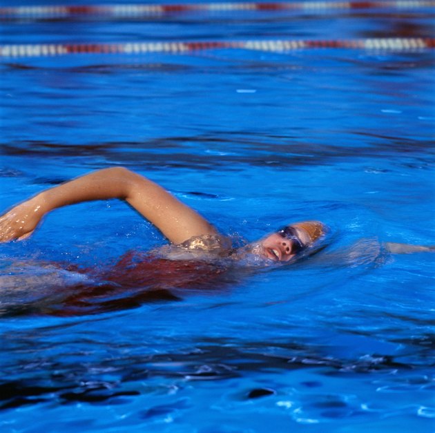 Woman Swimming in Pool