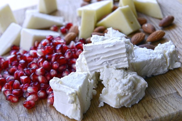 set of goat cheese on a wooden board