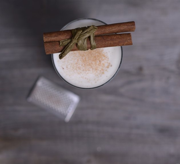 Glass of milk with cinnamon