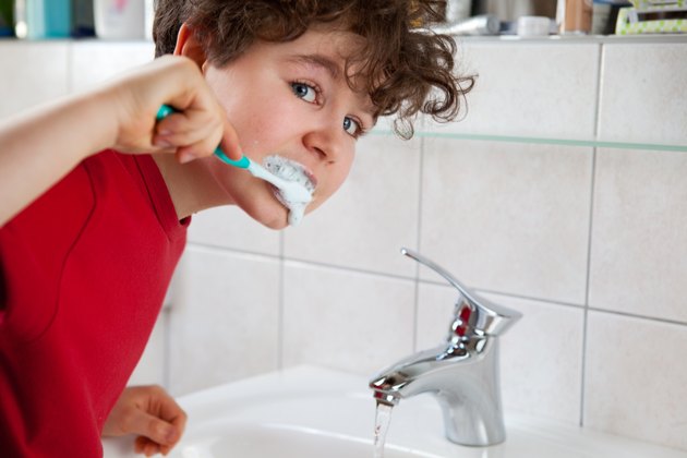 Boy brushing teethes