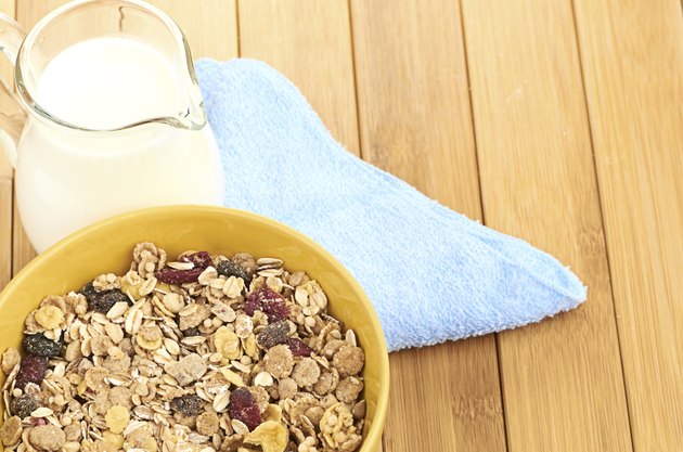 Delicious and healthy cereal in bowl with milk