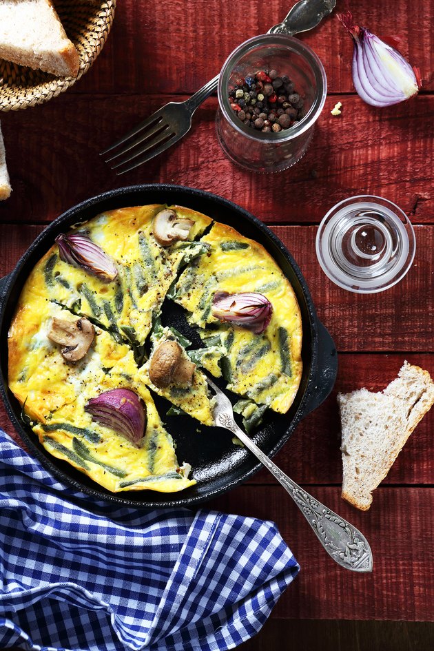 Scrambled eggs with mushrooms in a pan