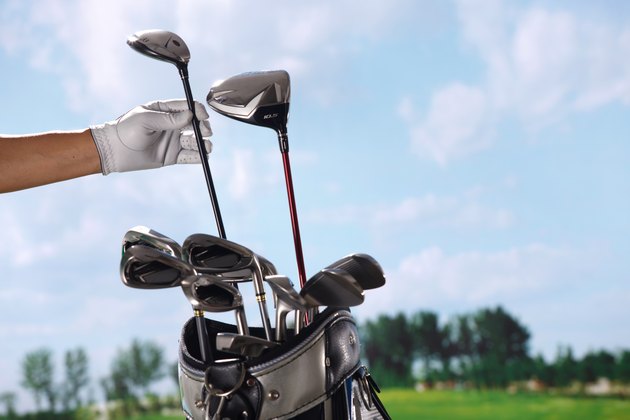 Removing golf club from bag