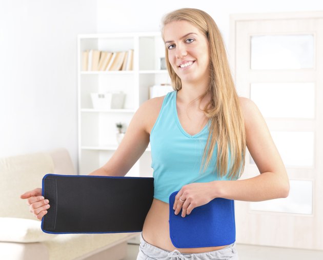 Woman wearing slimming belt