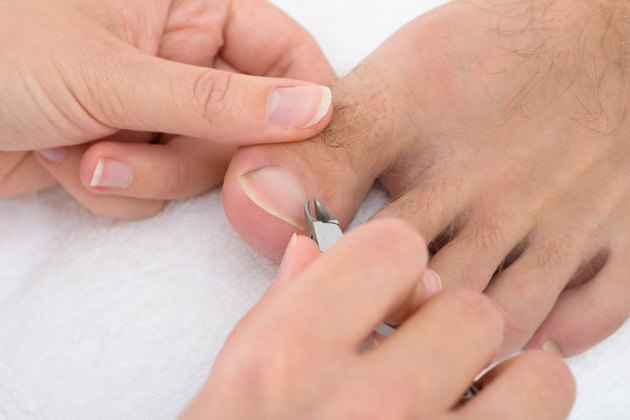 Beautician Trimming Cuticles