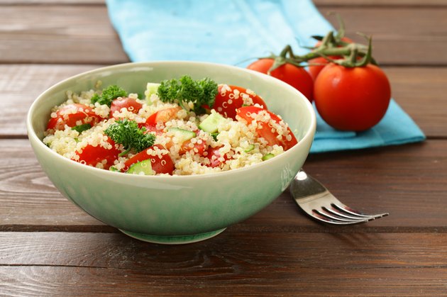 Quinoa salad with cucumber and tomato in a bowl
