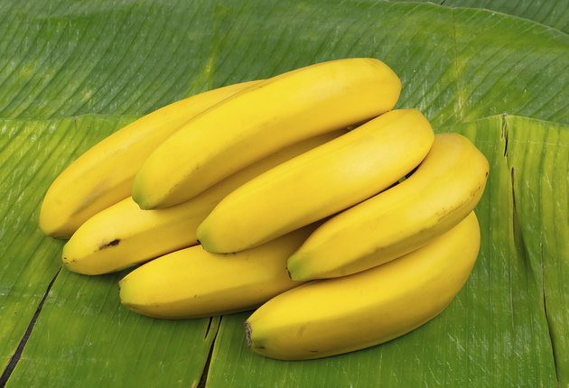 perfect yellow bananas on a banana leaf