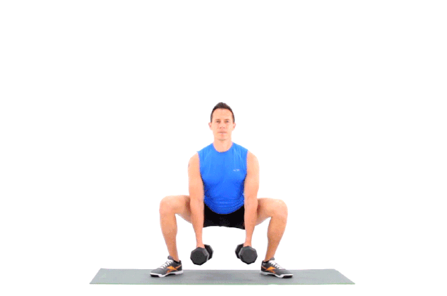Man performing dumbbell squats.