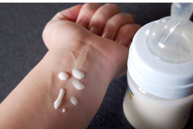 breastmilk warm milk bottled squirt inside temperature test wrist tiny livestrong step onto