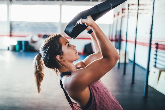 woman strength training at the gym