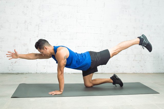 Blaine Strong doing the bird-dog exercise for the push-up challenge workout