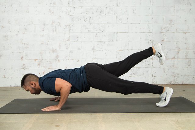 Mike Donavanik demonstrates a push-up with leg lift