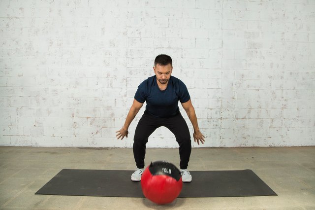 Mike Donavanik demonstrates a medicine ball slam
