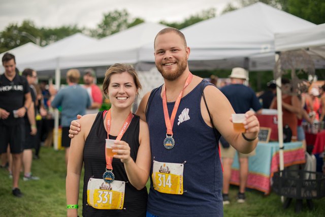Runners with a beer after a Craft Brew Race