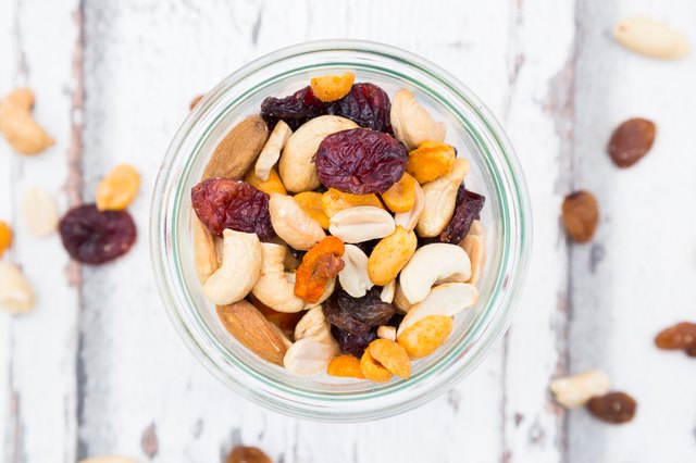 Cup of Natural Trail mix with cashews, peanuts, cranberries