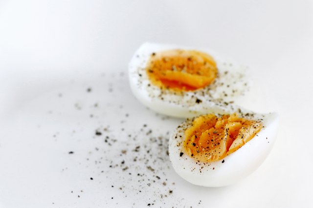 Hard boiled eggs with salt and pepper